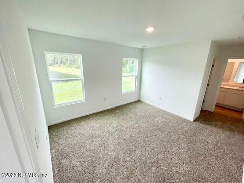 Spacious, unfurnished interior of a new home in Grand Reserve, Bunnell (Image 57).