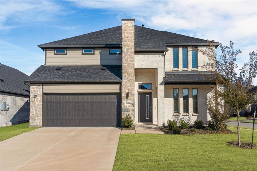 Front exterior of a new home in Wolf Creek Farms, Melissa, TX, highlighting curb appeal (Image 2).