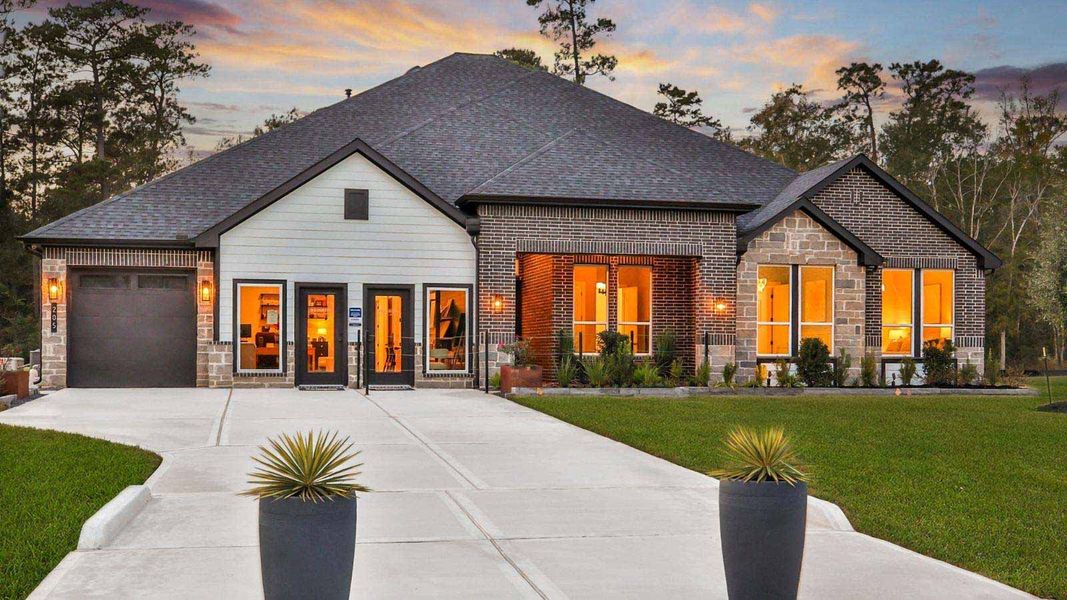 Representative exterior photo of a completed home built from the Galway by D.R. Horton in Butlers Bend Estates, Pinehurst, TX (Image 27). Representative exterior photo of a completed home built from the Galway by D.R. Horton in Butlers Bend Estates, Pinehurst, TX (Image 27).