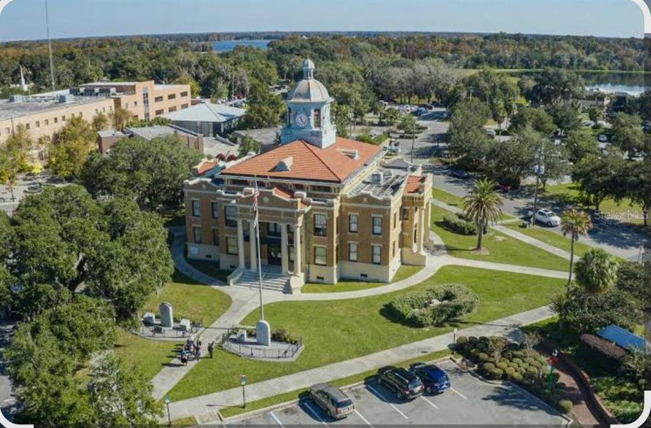 Front exterior of a new home in , Inverness, FL, highlighting curb appeal (Image 16).