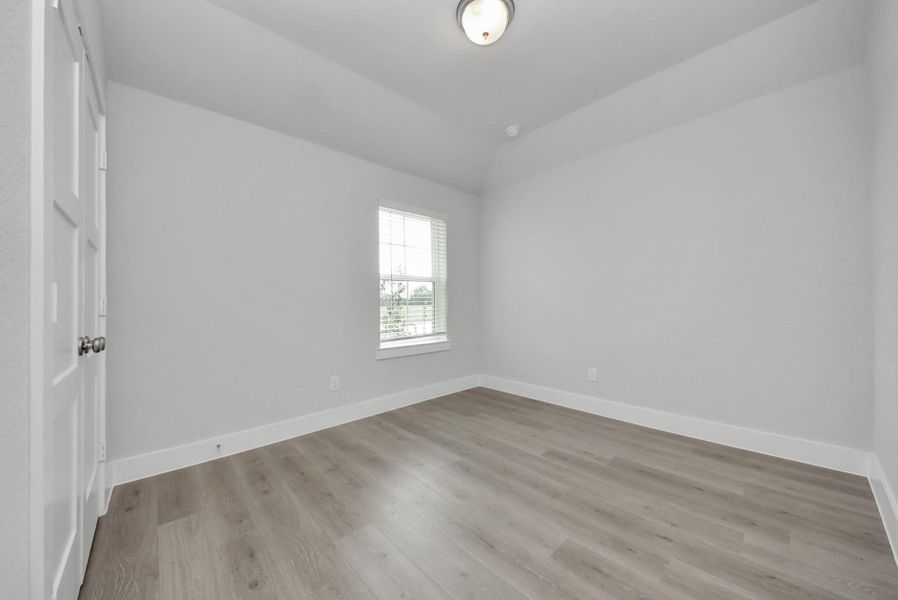 Spacious, unfurnished interior of a new home in Sunrise Cove: Landmark Collection, Texas City (Image 24).