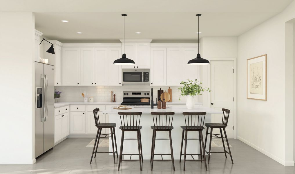 Kitchen with pendant lights over island