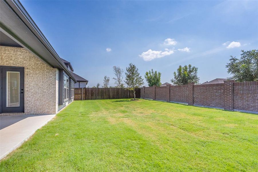Front exterior of a new home in Willow Wood Classic 60, McKinney, TX, highlighting curb appeal (Image 19). Front exterior of a new home in Willow Wood Classic 60, McKinney, TX, highlighting curb appeal (Image 19).