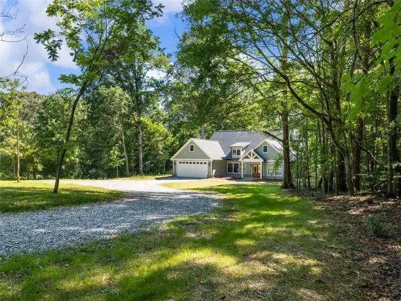Front exterior of a new home in , Cleveland, GA, highlighting curb appeal (Image 2). Front exterior of a new home in , Cleveland, GA, highlighting curb appeal (Image 2).