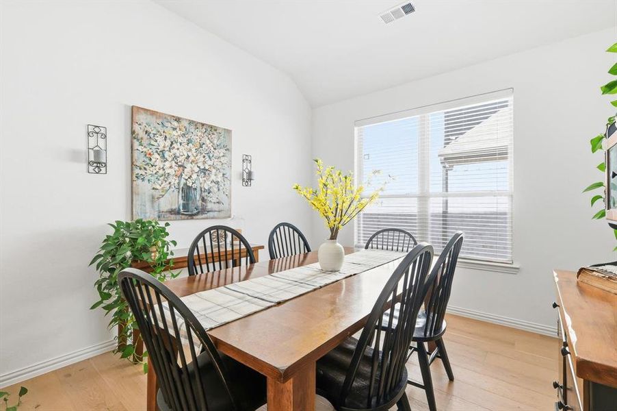 Office being used as a formal dining area
