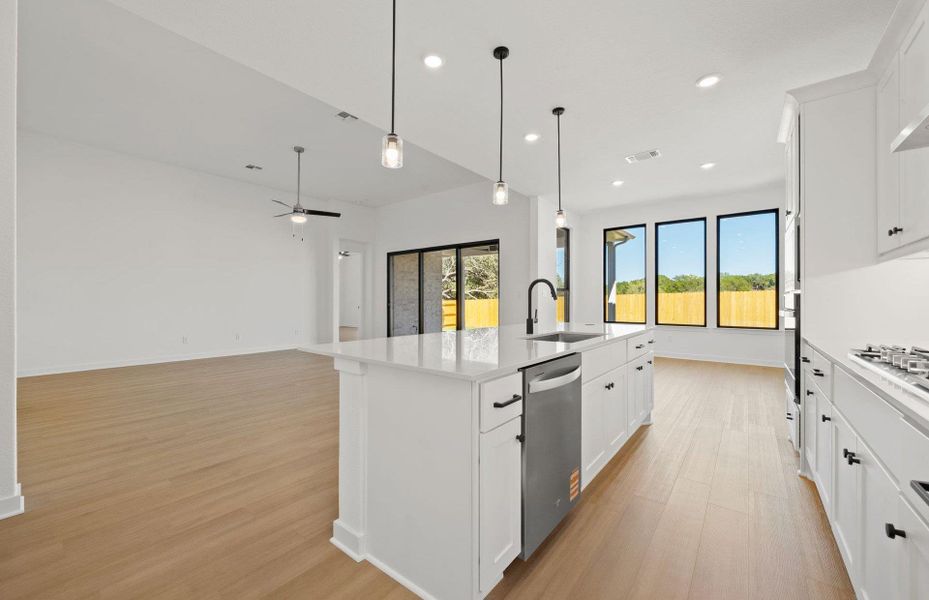 Furnished interior view inside a new home in 6 Creeks, Kyle (Image 7).