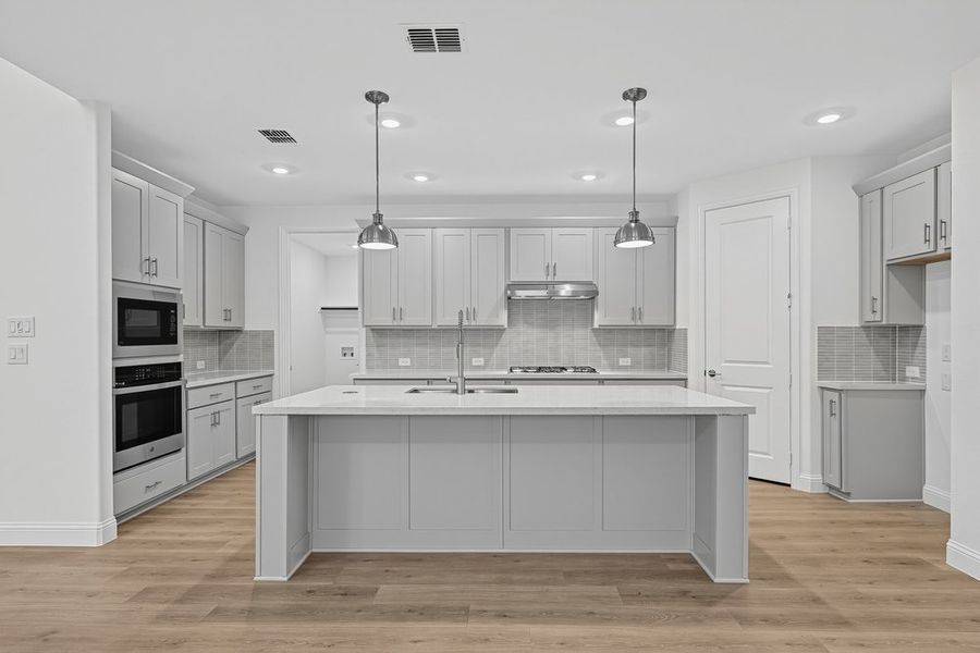 Furnished interior view inside a new home in South Oak, Lakewood Village (Image 5).