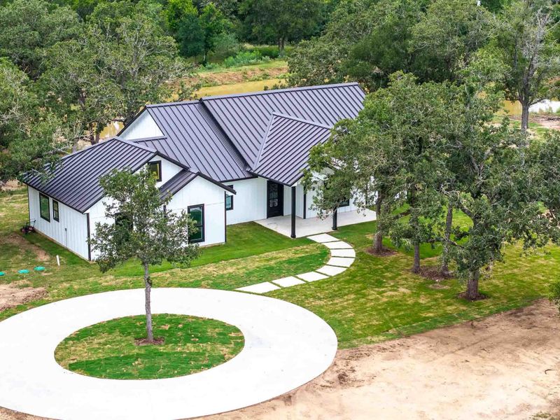 Front exterior of a new home in , Lockhart, TX, highlighting curb appeal (Image 2). Front exterior of a new home in , Lockhart, TX, highlighting curb appeal (Image 2).