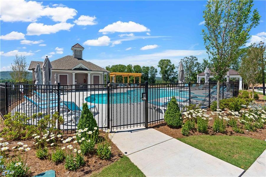 Front exterior of a new home in Palisades Townhomes, Cumming, GA, highlighting curb appeal (Image 24). Front exterior of a new home in Palisades Townhomes, Cumming, GA, highlighting curb appeal (Image 24).