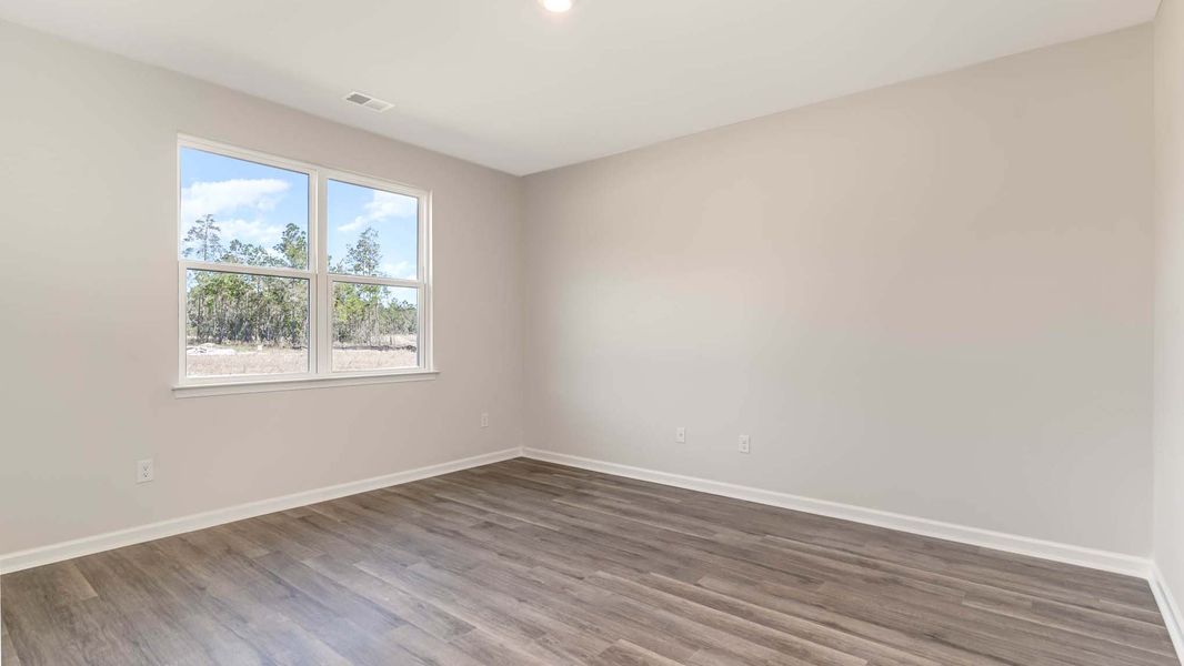 Representative unfurnished interior of a home built from the ARIA by D.R. Horton in Sandridge Park, Little River (Image 18).