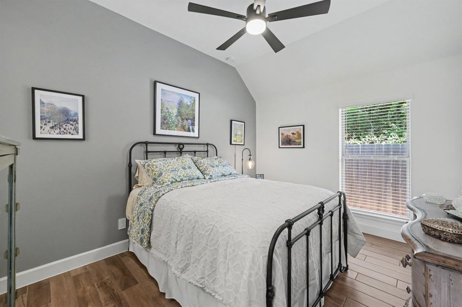 There is an accent wall, ceiling fan, and the home has two inch blinds throughout. There is an accent wall, ceiling fan, and the home has two inch blinds throughout.