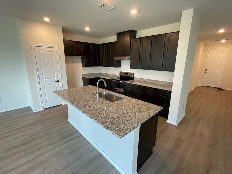 Furnished interior view inside a new home in Mustang Valley, Manor (Image 11). Furnished interior view inside a new home in Mustang Valley, Manor (Image 11).