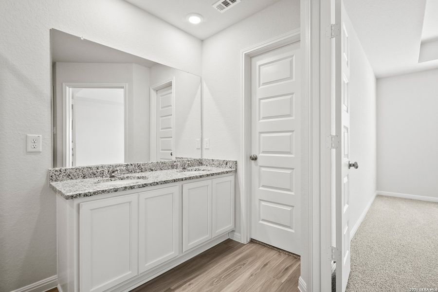 Furnished interior view inside a new home in Hunters Ranch, San Antonio (Image 8).
