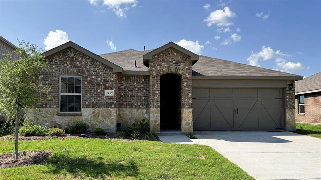 Front exterior of a new home in Cartwright Ranch, Crandall, TX, highlighting curb appeal (Image 11). Front exterior of a new home in Cartwright Ranch, Crandall, TX, highlighting curb appeal (Image 11).