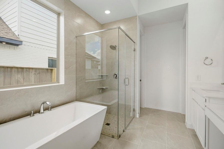 Primary Bathroom with freestanding tub. Primary Bathroom with freestanding tub.