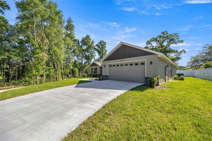 Front exterior of a new home in , Ocala, FL, highlighting curb appeal (Image 30).