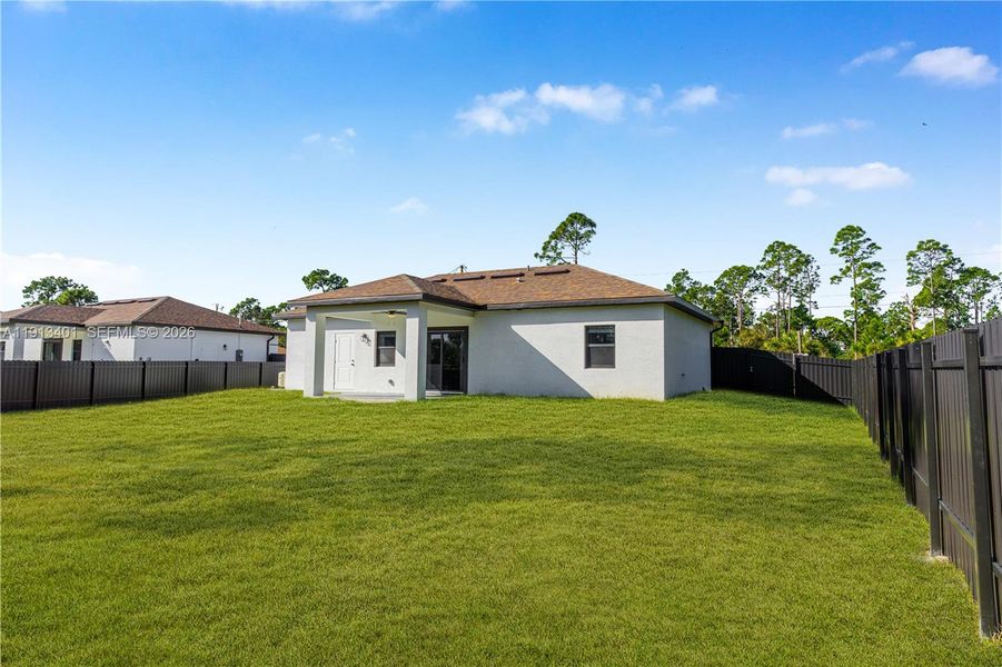 Exterior details and patio area of a home in , Lehigh Acres (Image 3).
