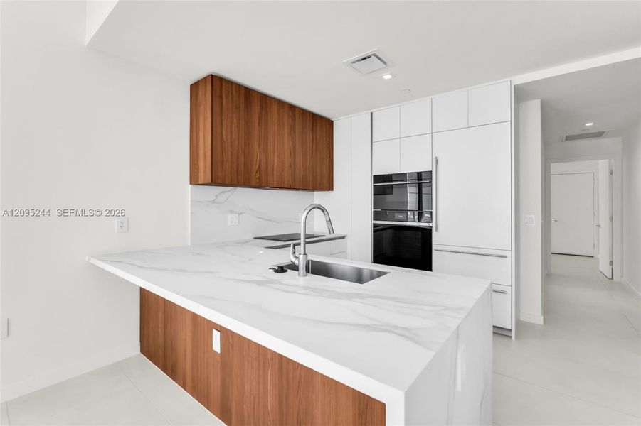 Furnished interior view inside a new home in , Miami (Image 8). Furnished interior view inside a new home in , Miami (Image 8).