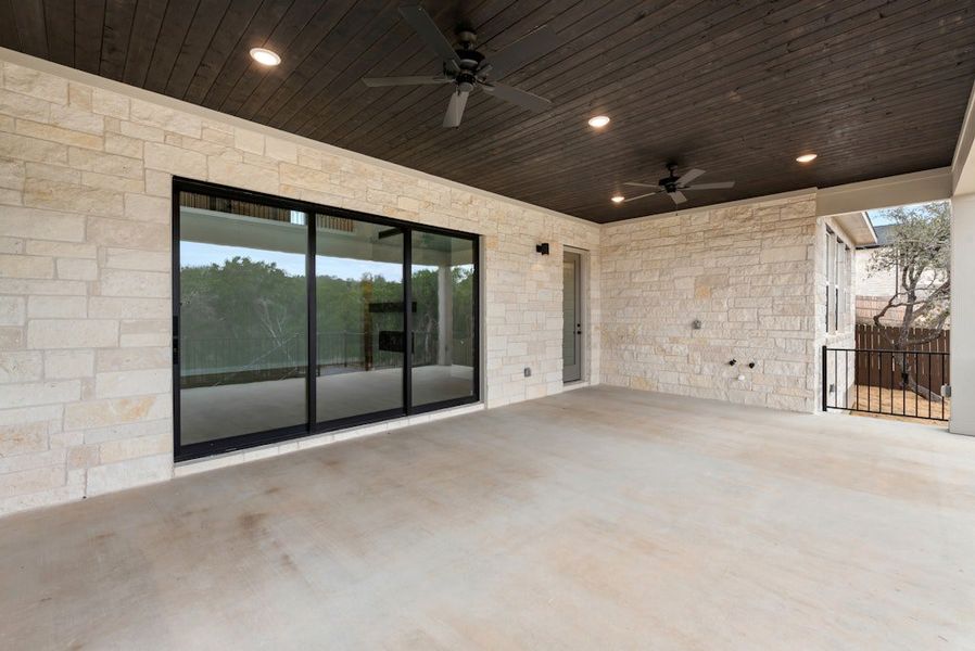 Exterior details and patio area of a home in Riverstone, Georgetown (Image 17).