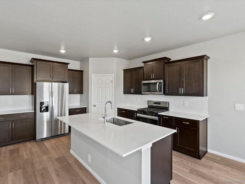 Furnished interior view inside a new home in Poudre Heights: The Lakes Collection, Windsor (Image 7).