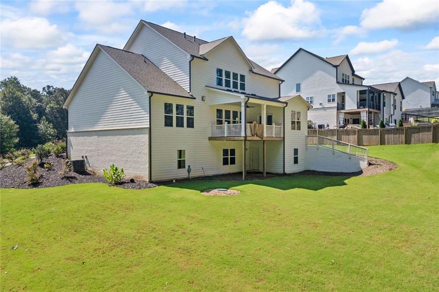 Front exterior of a new home in , Hoschton, GA, highlighting curb appeal (Image 2). Front exterior of a new home in , Hoschton, GA, highlighting curb appeal (Image 2).