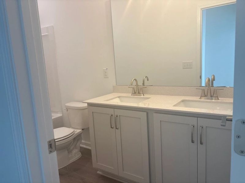 Bath 2 featuring the AW Collection® Milan - Stylish finishes and dramatic contrast throughout.