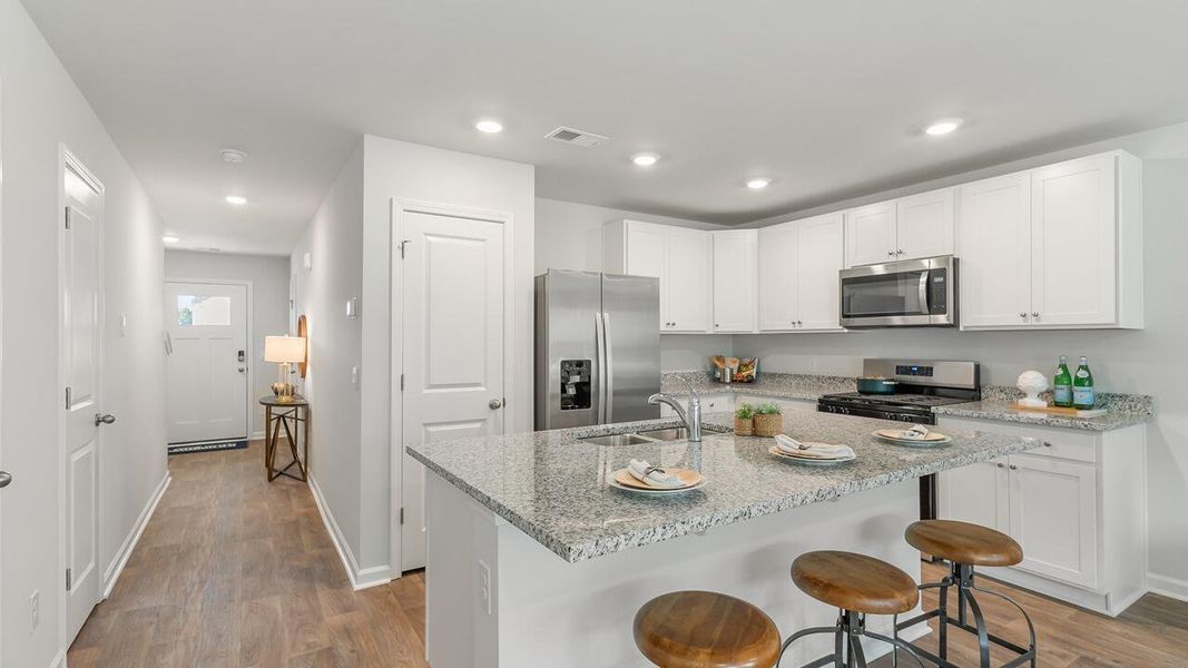 Furnished interior view inside a new home in Pine Hills Townhomes at Cane Bay, Summerville (Image 8).