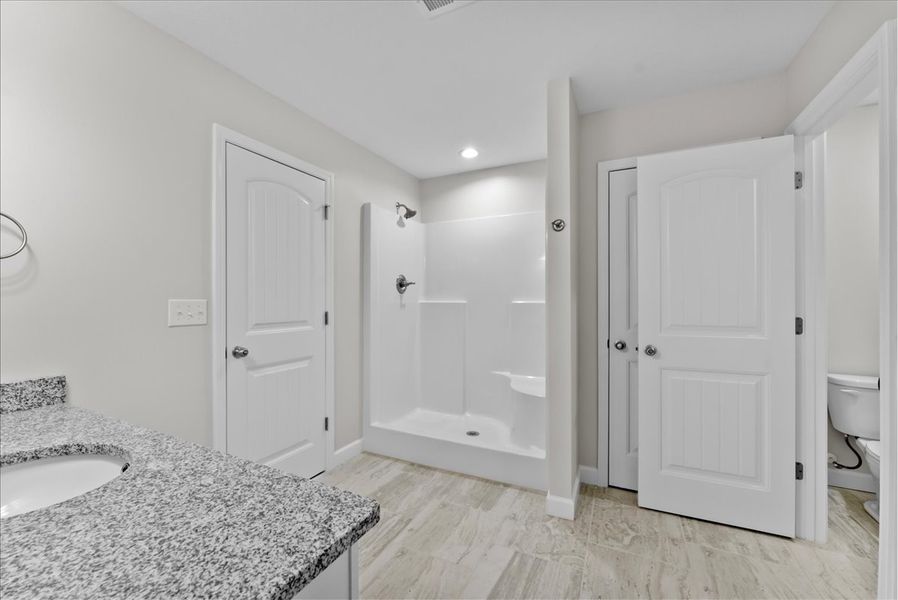 Representative furnished interior of a home built from the Addington by Enchanted Homes in Davis Heights, Inman (Image 36).