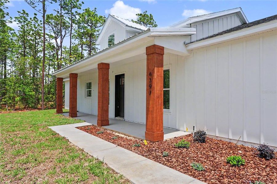 Exterior details and patio area of a home in , Ocala (Image 24).