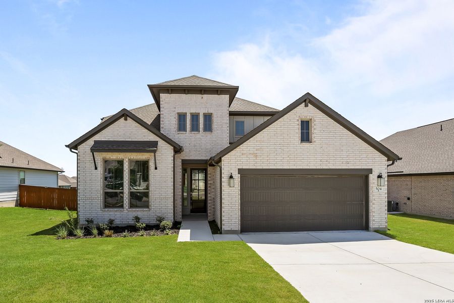 Front exterior of a new home in Foxbrook, Cibolo, TX, highlighting curb appeal (Image 27).