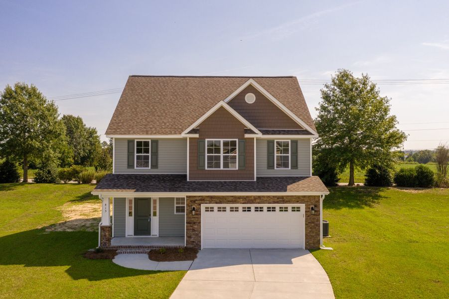 Representative exterior photo of a completed home built from the Rockbridge by Bill Clark Homes in Davenport Farms, Winterville, NC (Image 28).