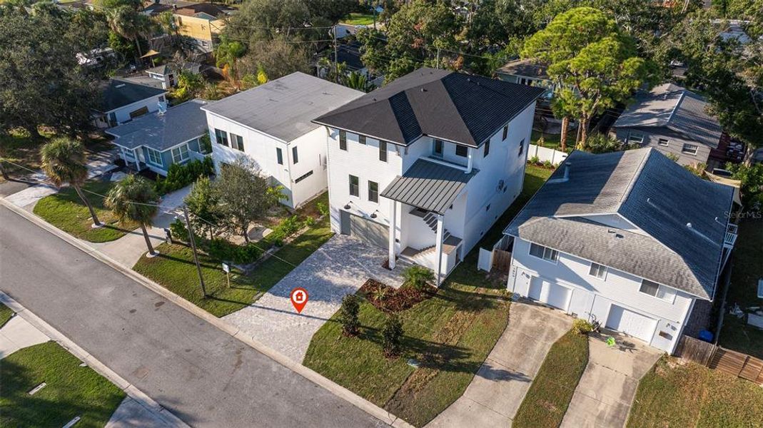 Front exterior of a new home in , St. Petersburg, FL, highlighting curb appeal (Image 20).