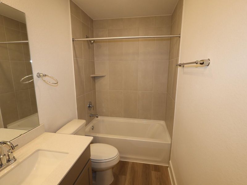 Furnished interior view inside a new home in Lone Star Landing, Montgomery (Image 14).