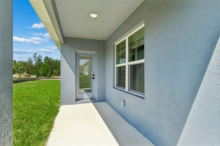 Exterior details and patio area of a home in Aspire at The Pines, Dunnellon (Image 3).