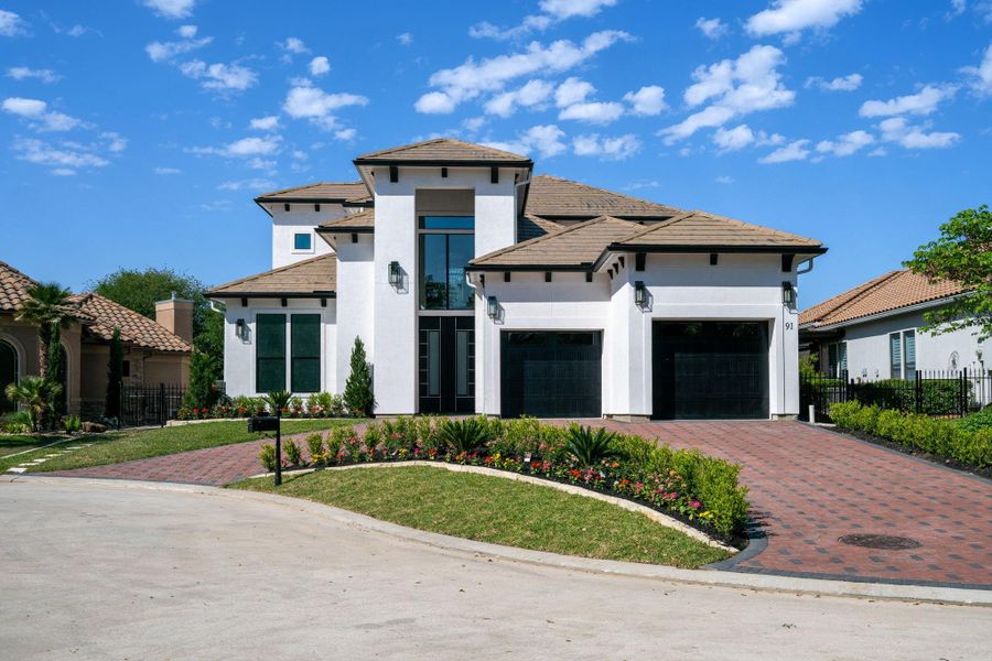 Front exterior of a new home in , Spring, TX, highlighting curb appeal (Image 26).