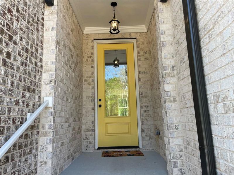 Exterior details and patio area of a home in The Collection at Wolf Creek, Lawrenceville (Image 3).