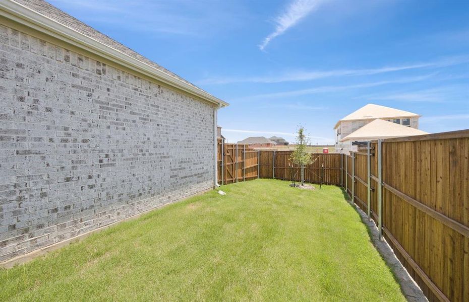 Oversized yard  *Real home pictured