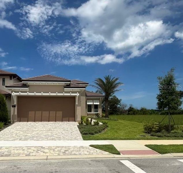 Front exterior of a new home in , Flagler Beach, FL, highlighting curb appeal (Image 12). Front exterior of a new home in , Flagler Beach, FL, highlighting curb appeal (Image 12).
