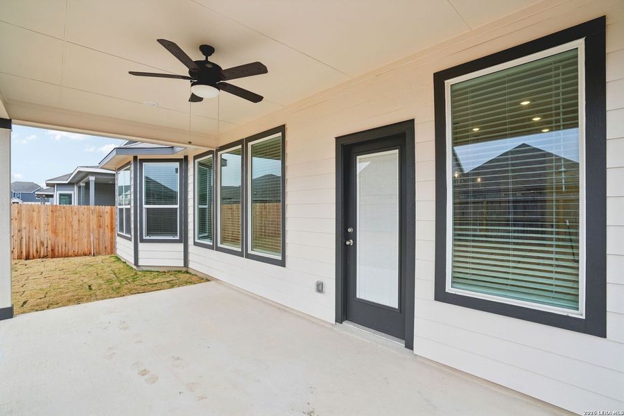 Exterior details and patio area of a home in Estancia Ranch - Classic Series, San Antonio (Image 26).