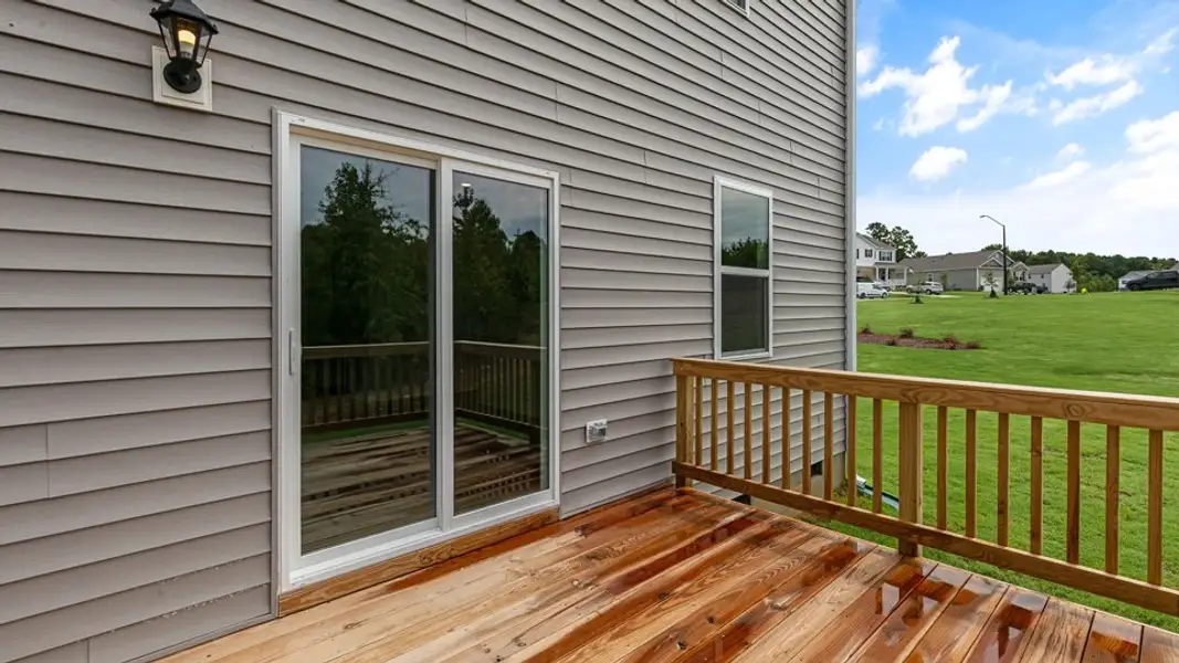 Exterior details and patio area of a home in Baker Farm, Youngsville (Image 3).