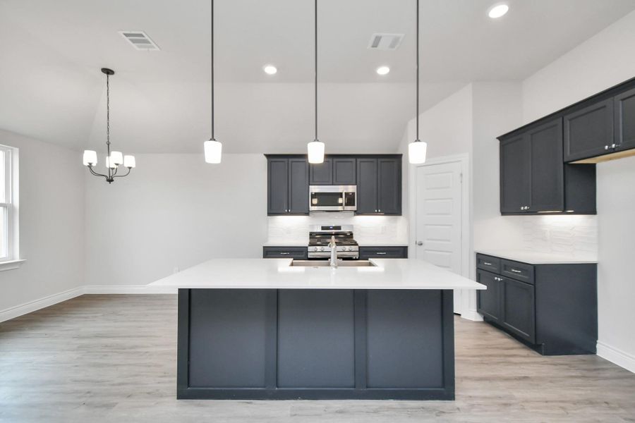 The open-concept layout creates a seamless flow, making it an ideal space for entertaining guests or enjoying quality time with your loved ones. The open-concept layout creates a seamless flow, making it an ideal space for entertaining guests or enjoying quality time with your loved ones.