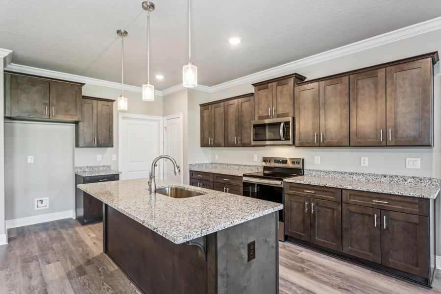 Representative furnished interior of a home built from the The Sapphire by Herbst Homes in Clear Water Landing, Milton (Image 57).