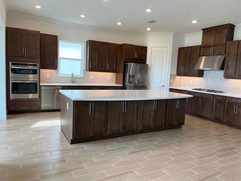 Furnished interior view inside a new home in Esplanade at Skye Ranch, Sarasota (Image 6).