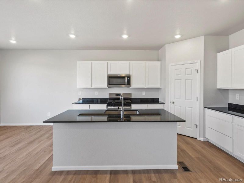 Furnished interior view inside a new home in Lake Bluff, Greeley (Image 7).