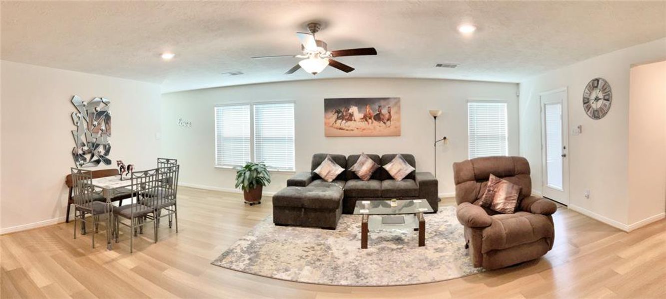 View of the living room and dining area.