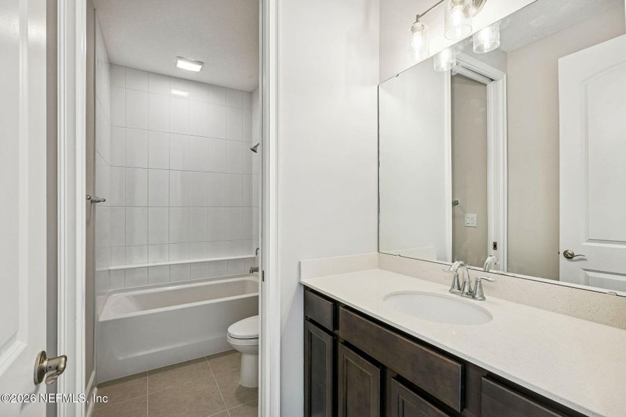 Furnished interior view inside a new home in Sandy Ridge, Yulee (Image 8).