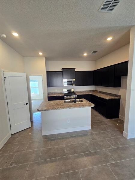 Furnished interior view inside a new home in , Inverness (Image 5).