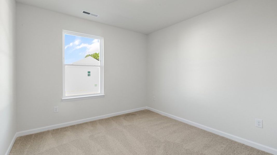 Spacious, unfurnished interior of a new home in The Townes at Honeycutt Oaks, Angier (Image 15).