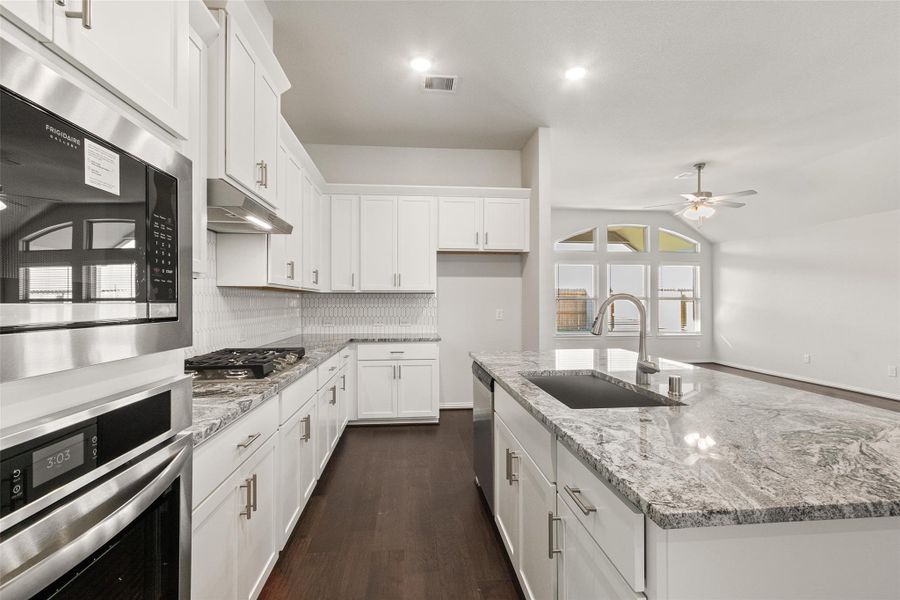 Furnished interior view inside a new home in Sunterra, Katy (Image 12).