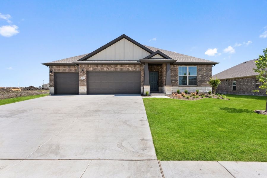Front exterior of a new home in Waverly Estates, Nevada, TX, highlighting curb appeal (Image 51).